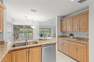 Sweeping lake and golf course views with no buildings beyond on Estero Country Club in Florida - for sale on GolfHomes.com, golf home, golf lot