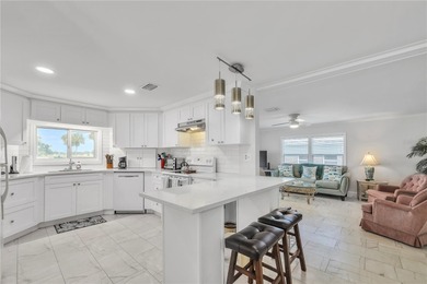 Discover comfort, style, and scenic golf course living in this on Maple Leaf Golf and Country Club in Florida - for sale on GolfHomes.com, golf home, golf lot