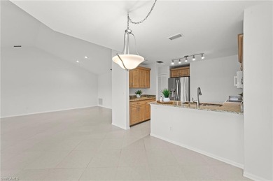 Sweeping lake and golf course views with no buildings beyond on Estero Country Club in Florida - for sale on GolfHomes.com, golf home, golf lot