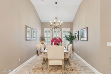 Experience luxury living in this stunning custom home in Amelia on Amelia National Golf and Country Club in Florida - for sale on GolfHomes.com, golf home, golf lot