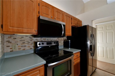 This turnkey furnished 3/2 condo with attached one car garage is on Eagle Ridge Golf and Tennis Club in Florida - for sale on GolfHomes.com, golf home, golf lot