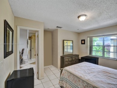 Welcome to your dream condo in the sought-after community of on Woodmont Country Club in Florida - for sale on GolfHomes.com, golf home, golf lot