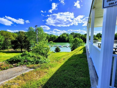 A golf front lot in a lakefront development sounds like a dream on Woodlake Golf Club in Tennessee - for sale on GolfHomes.com, golf home, golf lot