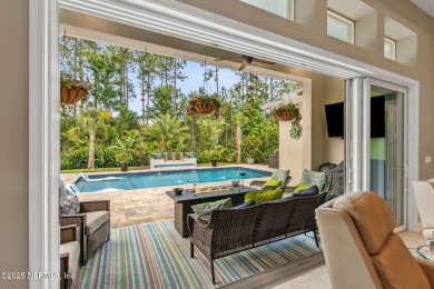 Experience luxury living in this stunning custom home in Amelia on Amelia National Golf and Country Club in Florida - for sale on GolfHomes.com, golf home, golf lot