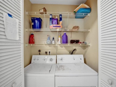 Welcome to your dream condo in the sought-after community of on Woodmont Country Club in Florida - for sale on GolfHomes.com, golf home, golf lot