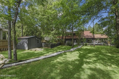 Craftsman style home for sale. Enjoy a country setting within on Diamondhead Country Club in Mississippi - for sale on GolfHomes.com, golf home, golf lot
