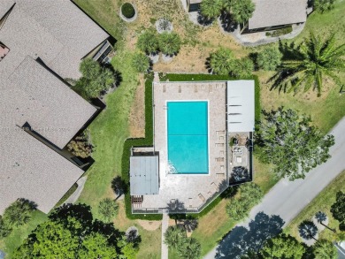 Welcome to your dream condo in the sought-after community of on Woodmont Country Club in Florida - for sale on GolfHomes.com, golf home, golf lot