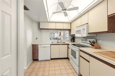 Welcome to this first-floor, pet-friendly 2BR/2BA END UNIT on Royal Palm Golf Club in Florida - for sale on GolfHomes.com, golf home, golf lot