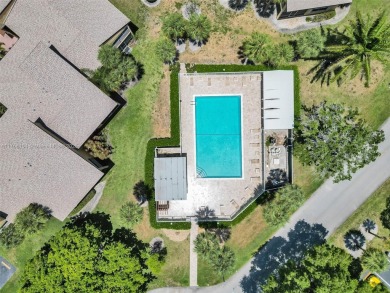Welcome to your dream condo in the sought-after community of on Woodmont Country Club in Florida - for sale on GolfHomes.com, golf home, golf lot