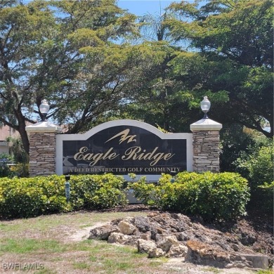 This turnkey furnished 3/2 condo with attached one car garage is on Eagle Ridge Golf and Tennis Club in Florida - for sale on GolfHomes.com, golf home, golf lot