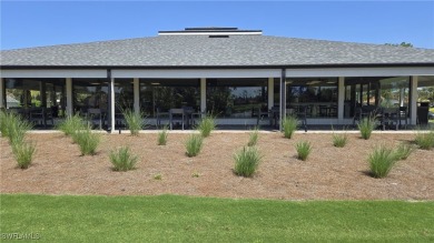 This turnkey furnished 3/2 condo with attached one car garage is on Eagle Ridge Golf and Tennis Club in Florida - for sale on GolfHomes.com, golf home, golf lot
