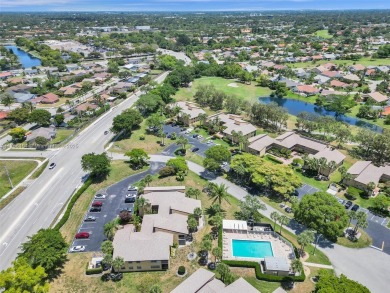 Welcome to your dream condo in the sought-after community of on Woodmont Country Club in Florida - for sale on GolfHomes.com, golf home, golf lot