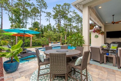 Experience luxury living in this stunning custom home in Amelia on Amelia National Golf and Country Club in Florida - for sale on GolfHomes.com, golf home, golf lot
