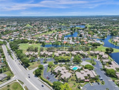 Welcome to your dream condo in the sought-after community of on Woodmont Country Club in Florida - for sale on GolfHomes.com, golf home, golf lot