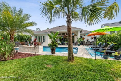 Experience luxury living in this stunning custom home in Amelia on Amelia National Golf and Country Club in Florida - for sale on GolfHomes.com, golf home, golf lot