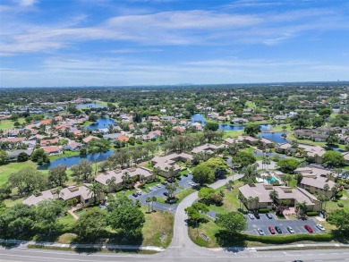 Welcome to your dream condo in the sought-after community of on Woodmont Country Club in Florida - for sale on GolfHomes.com, golf home, golf lot
