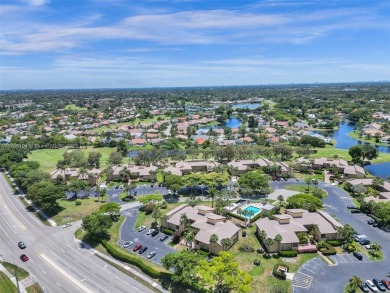 Welcome to your dream condo in the sought-after community of on Woodmont Country Club in Florida - for sale on GolfHomes.com, golf home, golf lot