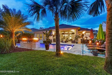 Experience luxury living in this stunning custom home in Amelia on Amelia National Golf and Country Club in Florida - for sale on GolfHomes.com, golf home, golf lot