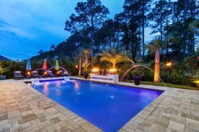 Experience luxury living in this stunning custom home in Amelia on Amelia National Golf and Country Club in Florida - for sale on GolfHomes.com, golf home, golf lot