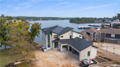 The nicest home in the most upscale subdivision at the LOZ! This on The Oaks Golf Course in Missouri - for sale on GolfHomes.com, golf home, golf lot