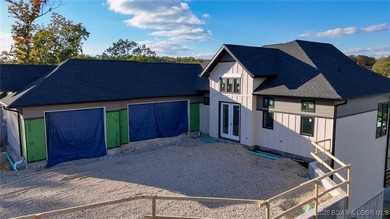 Amazing New Waterfront Home built by Thomas Construction in on The Oaks Golf Course in Missouri - for sale on GolfHomes.com, golf home, golf lot