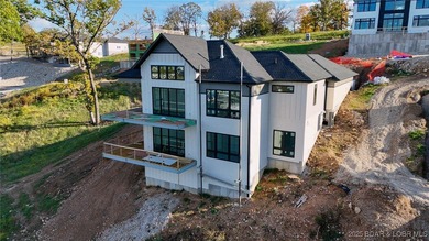 Amazing New Waterfront Home built by Thomas Construction in on The Oaks Golf Course in Missouri - for sale on GolfHomes.com, golf home, golf lot