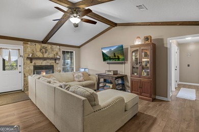 Welcome home to this lovely 4 bedroom, 2 bath ranch with 1,862 on Cherokee Rose Country Club in Georgia - for sale on GolfHomes.com, golf home, golf lot