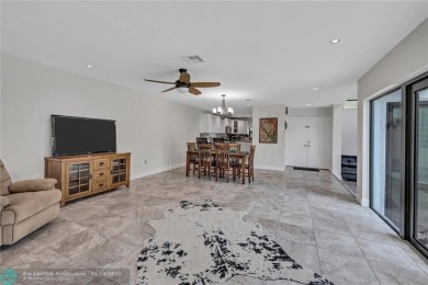 This Charming completely Renovated town home with IMPACT WINDOW on Jacaranda Golf Club in Florida - for sale on GolfHomes.com, golf home, golf lot