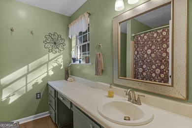 Welcome home to this lovely 4 bedroom, 2 bath ranch with 1,862 on Cherokee Rose Country Club in Georgia - for sale on GolfHomes.com, golf home, golf lot