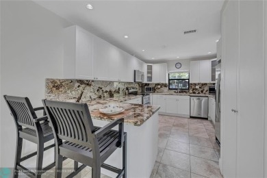 This Charming completely Renovated town home with IMPACT WINDOW on Jacaranda Golf Club in Florida - for sale on GolfHomes.com, golf home, golf lot