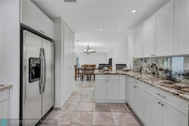 This Charming completely Renovated town home with IMPACT WINDOW on Jacaranda Golf Club in Florida - for sale on GolfHomes.com, golf home, golf lot