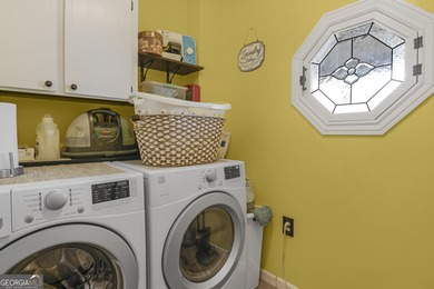 Welcome home to this lovely 4 bedroom, 2 bath ranch with 1,862 on Cherokee Rose Country Club in Georgia - for sale on GolfHomes.com, golf home, golf lot