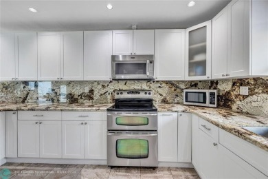 This Charming completely Renovated town home with IMPACT WINDOW on Jacaranda Golf Club in Florida - for sale on GolfHomes.com, golf home, golf lot