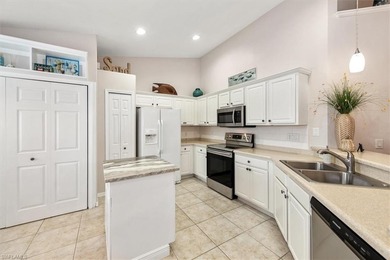 Discover an unparalleled Florida lifestyle in this light & on Colonial Country Club in Florida - for sale on GolfHomes.com, golf home, golf lot