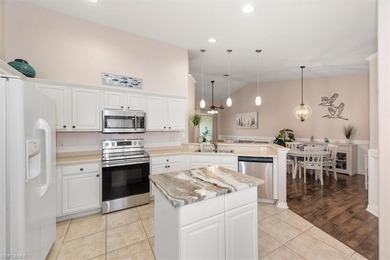 Discover an unparalleled Florida lifestyle in this light & on Colonial Country Club in Florida - for sale on GolfHomes.com, golf home, golf lot