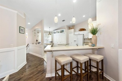 Discover an unparalleled Florida lifestyle in this light & on Colonial Country Club in Florida - for sale on GolfHomes.com, golf home, golf lot