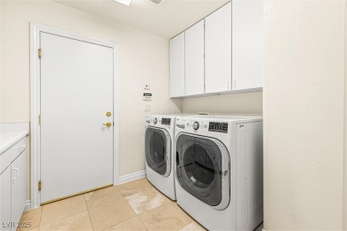 This exceptional property, located within the gated community of on  in Nevada - for sale on GolfHomes.com, golf home, golf lot
