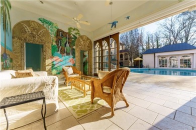 *Evergreen* Estate  is set on a ridge-top lot above the city in on Bobby Jones Golf Club in Georgia - for sale on GolfHomes.com, golf home, golf lot