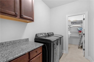 Welcome to this beautifully designed 4-bedroom, 2-bathroom home on Glenlakes Golf Club in Alabama - for sale on GolfHomes.com, golf home, golf lot