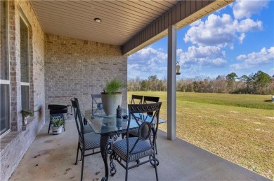 Welcome to this beautifully designed 4-bedroom, 2-bathroom home on Glenlakes Golf Club in Alabama - for sale on GolfHomes.com, golf home, golf lot