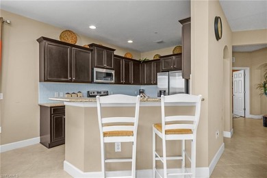 Spectacular sunsets, rare double water views, and a front-row on The Golf Lodge At the Quarry in Florida - for sale on GolfHomes.com, golf home, golf lot