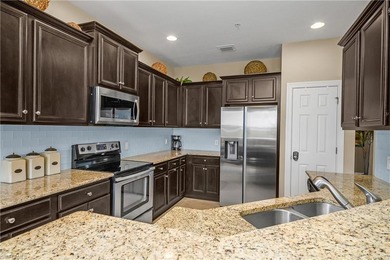 Spectacular sunsets, rare double water views, and a front-row on The Golf Lodge At the Quarry in Florida - for sale on GolfHomes.com, golf home, golf lot