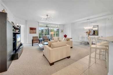 In a lush, tropical oasis, this second-floor resort-style on The Colony Golf and Country Club in Florida - for sale on GolfHomes.com, golf home, golf lot