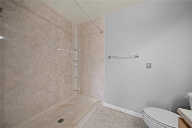 Privacy, peaceful woods, and a well-maintained home ready for on Bella Vista Country Club and Golf Course in Arkansas - for sale on GolfHomes.com, golf home, golf lot