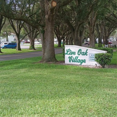 Two bedroom, one and a half bath second floor condominium on Country Club At Silver Springs Shores in Florida - for sale on GolfHomes.com, golf home, golf lot