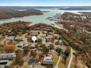 Offered at $130K as-is, this 2-bedroom, 2-bathroom condo is on Kimberling City Golf Club in Missouri - for sale on GolfHomes.com, golf home, golf lot