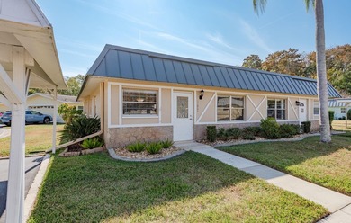 Welcome to Paradise Pointe West at Summertree, a charming on Summertree Golf Course in Florida - for sale on GolfHomes.com, golf home, golf lot