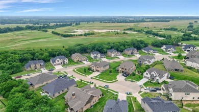 Welcome to 2113 Deer Run Court -- a stunning Taylor Morrison on The Bridges Golf Club in Texas - for sale on GolfHomes.com, golf home, golf lot