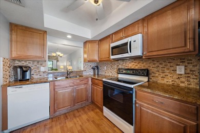 Discover this beautifully updated furnished 2-bedroom on Capri Isle Golf Club in Florida - for sale on GolfHomes.com, golf home, golf lot