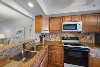 Discover this beautifully updated furnished 2-bedroom on Capri Isle Golf Club in Florida - for sale on GolfHomes.com, golf home, golf lot